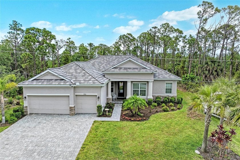 This well designed residence in the waterfront community of - Beach Home for sale in Port Charlotte, Florida on Beachhouse.com
