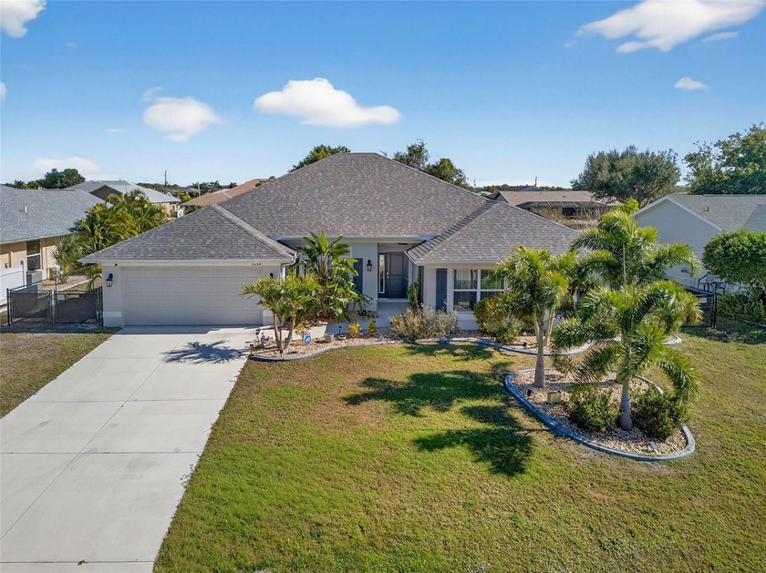 DEEP CREEK! Updated 4-bedroom, 3-bath, oversized 2-car garage - Beach Home for sale in Punta Gorda, Florida on Beachhouse.com