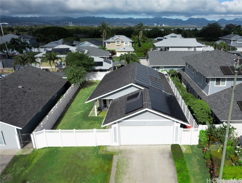 Discover the charm of this one-story home nestled in the - Beach Home for sale in Ewa Beach, Hawaii on Beachhouse.com