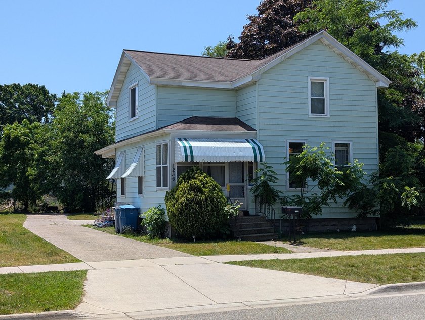 Welcome to 1236 Fulton, a sturdy duplex in the City of Grand - Beach Home for sale in Grand Haven, Michigan on Beachhouse.com