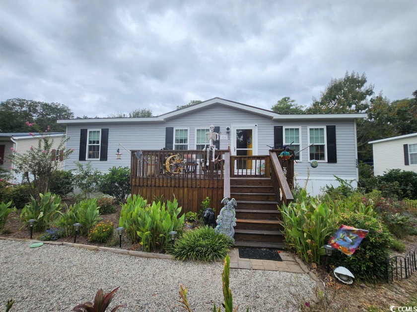 This cozy home, located steps from the marsh, and minutes from - Beach Home for sale in Garden City Beach, South Carolina on Beachhouse.com