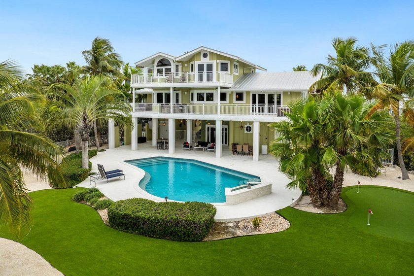 Nestled along the Florida Bay in exclusive Buccaneer Point, this - Beach Home for sale in Key Largo, Florida on Beachhouse.com