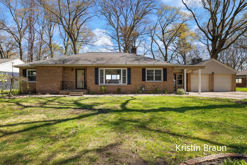 Welcome to 4078 Highgate, nestled in the established Roodmont - Beach Home for sale in Norton Shores, Michigan on Beachhouse.com