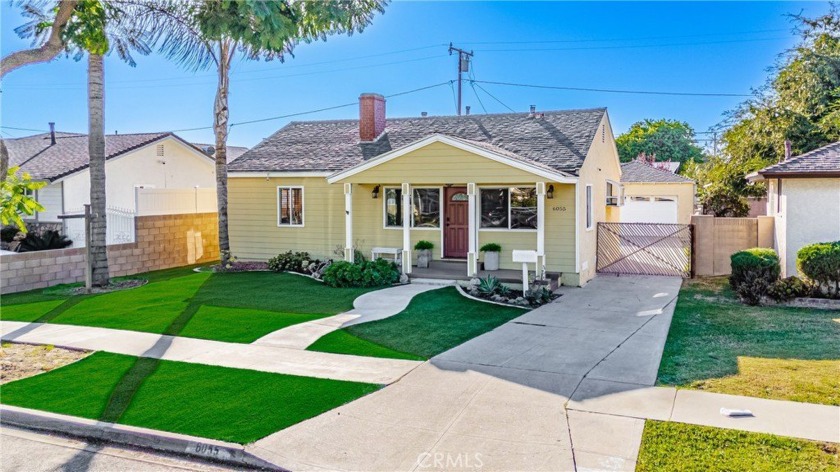 Welcome to this storybook-like 3 bedroom, 2 bath home nestled on - Beach Home for sale in Lakewood, California on Beachhouse.com