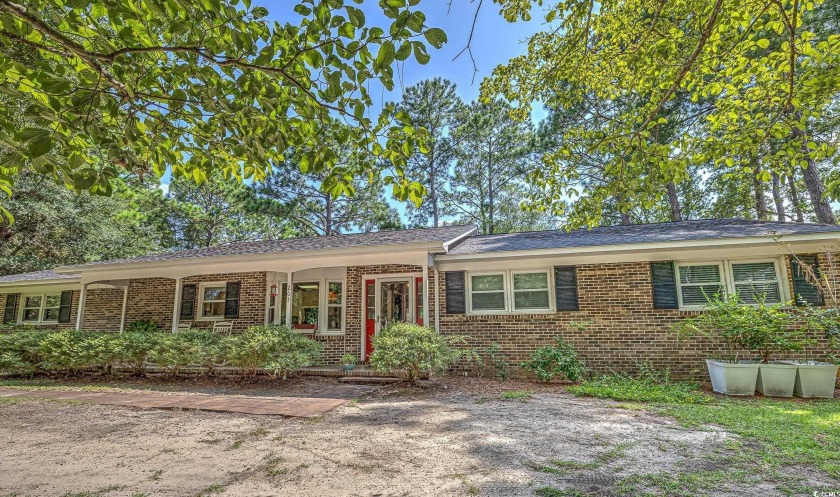 Charming All-Brick Home with NO HOA and a HUGE LOT. This - Beach Home for sale in Pawleys Island, South Carolina on Beachhouse.com