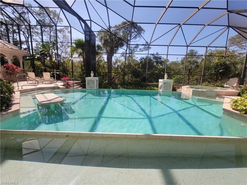 THE LARGEST OF ONLY 5 RIVERFRONT HOMES IN COLLIER'S RESERVE - Beach Home for sale in Naples, Florida on Beachhouse.com