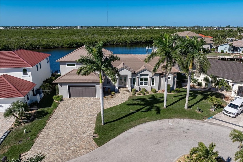 EXCEPTIONAL TWO-STORY HOME IN BSI W/FANTASTIC CANAL BASIN VIEW & - Beach Home for sale in Punta Gorda, Florida on Beachhouse.com
