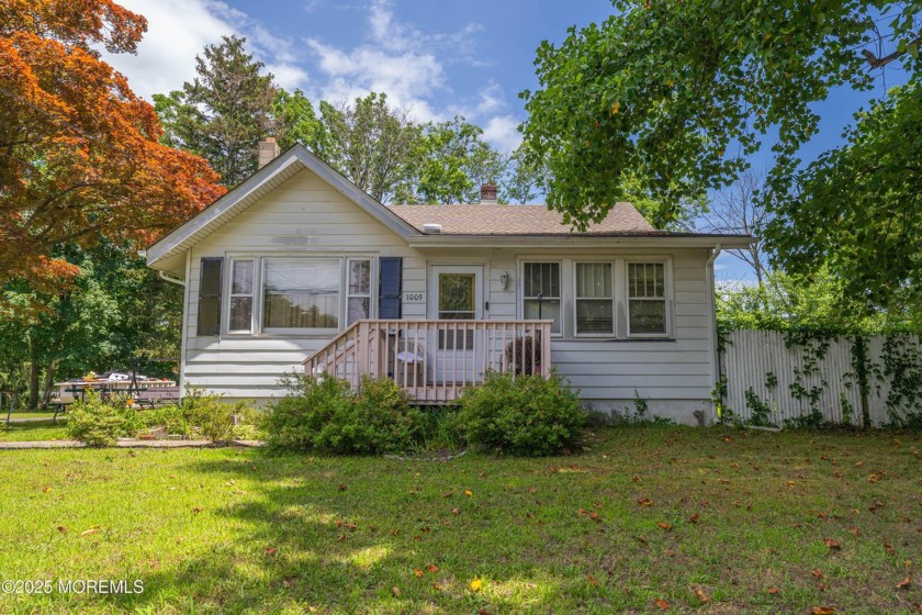 Welcome to this spacious 6-bedroom, 2.5-bath home offering - Beach Home for sale in Neptune, New Jersey on Beachhouse.com