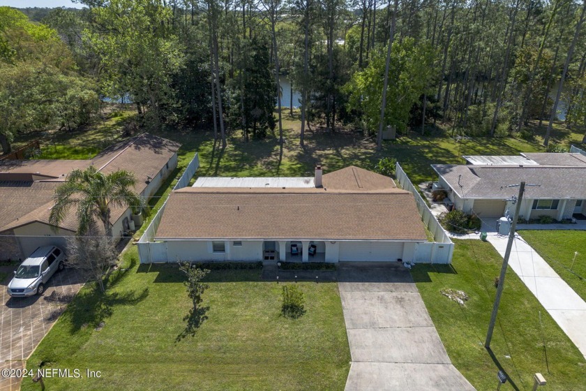 MUST SEE!! Waterfront property in Palm Coast! Stucco/concrete - Beach Home for sale in Palm Coast, Florida on Beachhouse.com