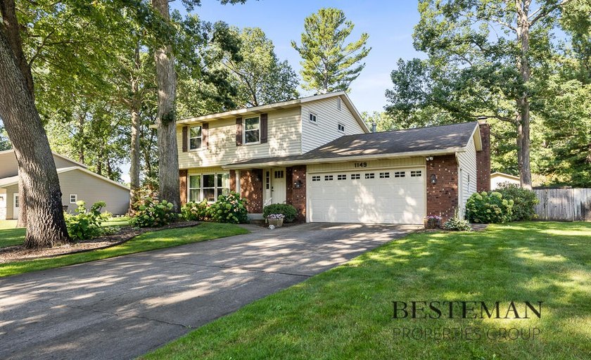 This well-cared-for two-story house with gorgeous inground pool - Beach Home for sale in Muskegon, Michigan on Beachhouse.com