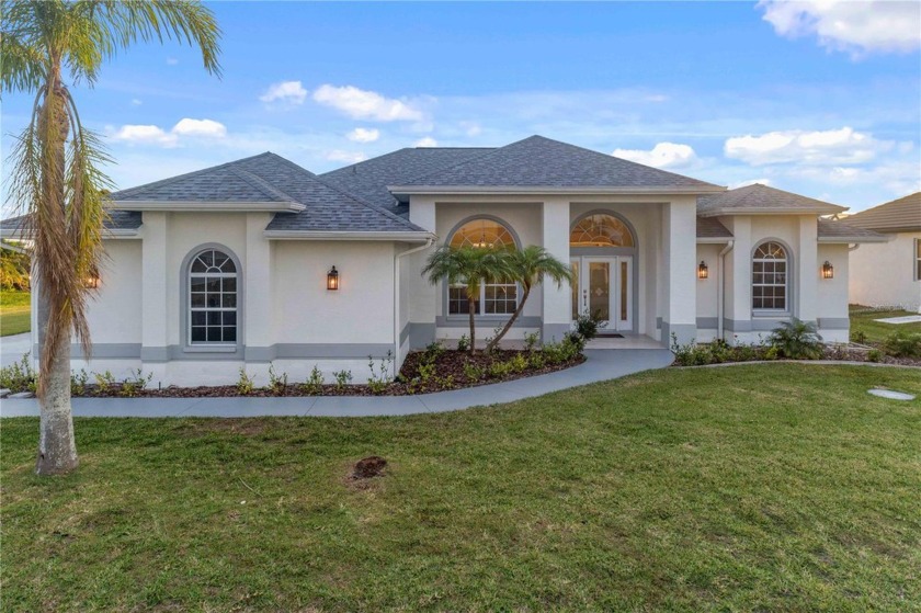 Stunning Waterfront Paradise on the Manchester Waterway awaits - Beach Home for sale in Port Charlotte, Florida on Beachhouse.com