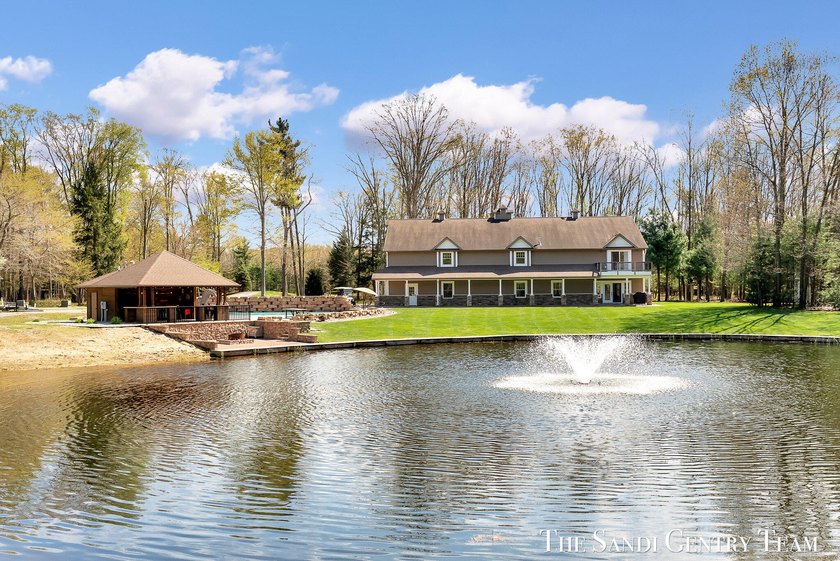 Welcome to this one-of-a-kind luxury barndominium where modern - Beach Home for sale in Grand Haven, Michigan on Beachhouse.com
