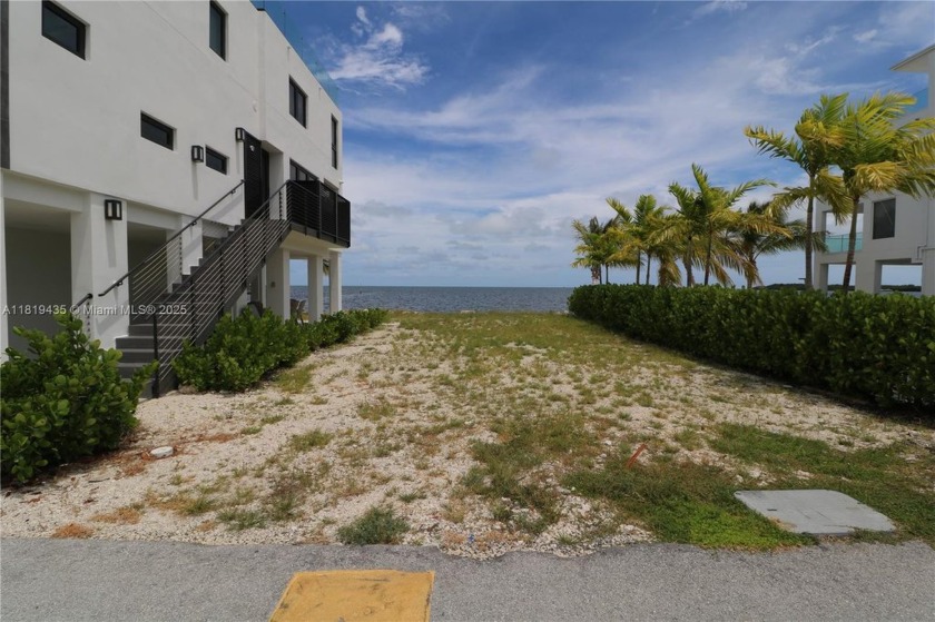 Seize the coveted waterfront opportunity at Key Largo Ocean - Beach Lot for sale in Key Largo, Florida on Beachhouse.com