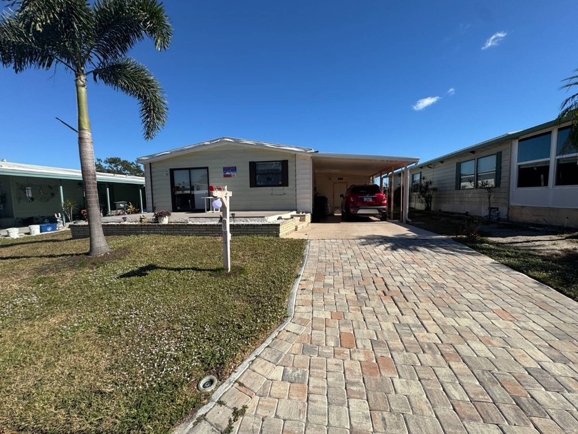 BIG UPDATES SINCE 2021: FLOORS 2021 + TPO ROOF, AC, PLUMBING - Beach Home for sale in Palmetto, Florida on Beachhouse.com