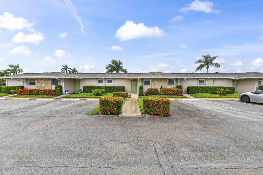 Discover this beautifully updated, move-in-ready corner villa - Beach Home for sale in West Palm Beach, Florida on Beachhouse.com