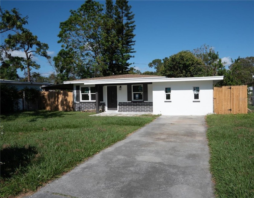 Discover this beautifully remodeled 3 bedroom, 2 bathroom home - Beach Home for sale in Clearwater, Florida on Beachhouse.com