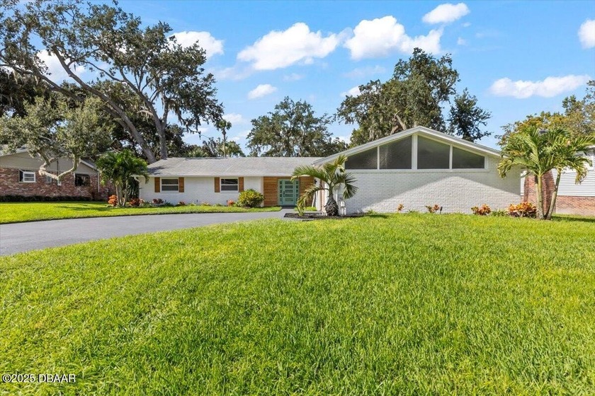 This beautiful, fully updated canal front pool home offers 4 - Beach Home for sale in Ormond Beach, Florida on Beachhouse.com