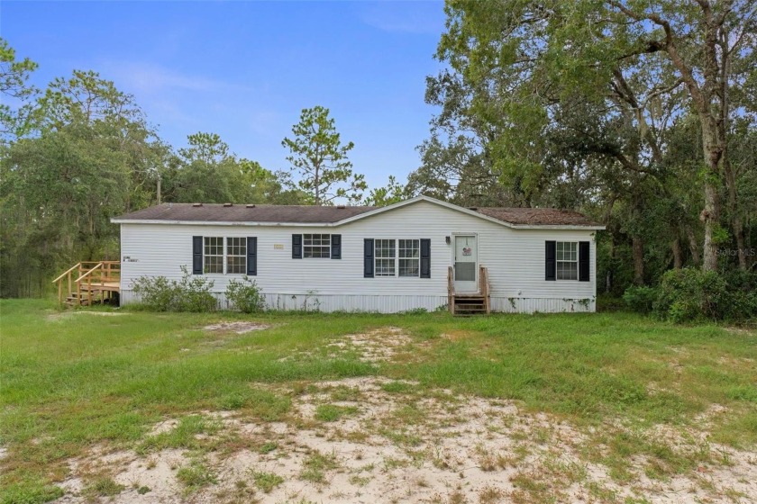OWNER MOTIVATED! Tucked away on 2.44 acres in the peaceful - Beach Home for sale in Homosassa, Florida on Beachhouse.com
