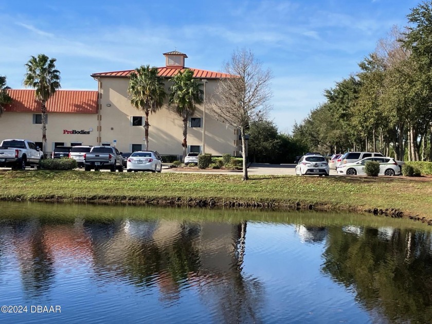 This nicely appointed modern professional office's floor plan - Beach Commercial for sale in Ormond Beach, Florida on Beachhouse.com