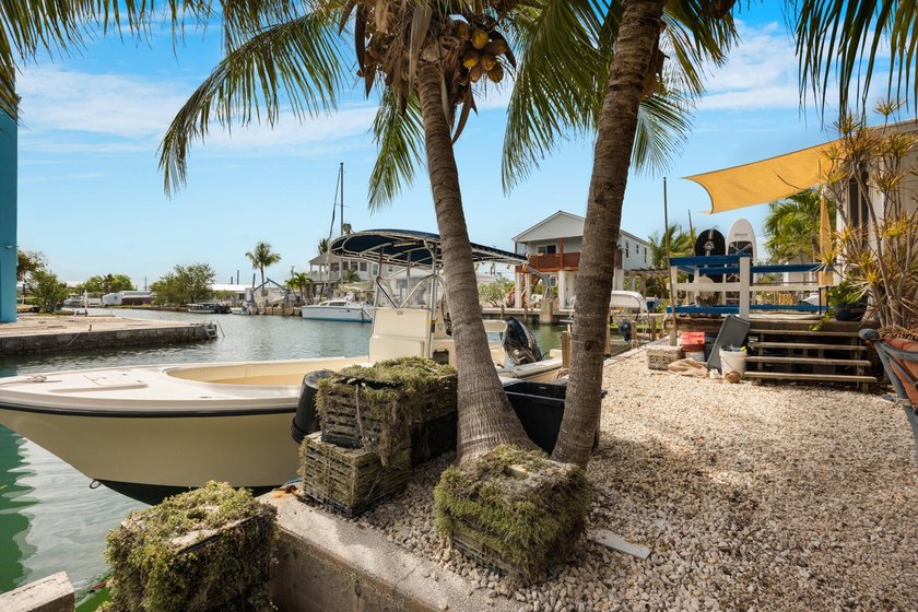 Discover laid back island living in this canal front, two - Beach Home for sale in Big Coppitt, Florida on Beachhouse.com