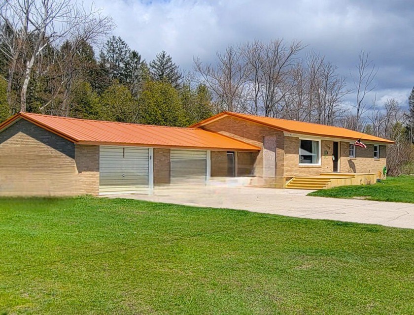 Picturesque setting on Schimke Creek with your own private - Beach Home for sale in Onekama, Michigan on Beachhouse.com