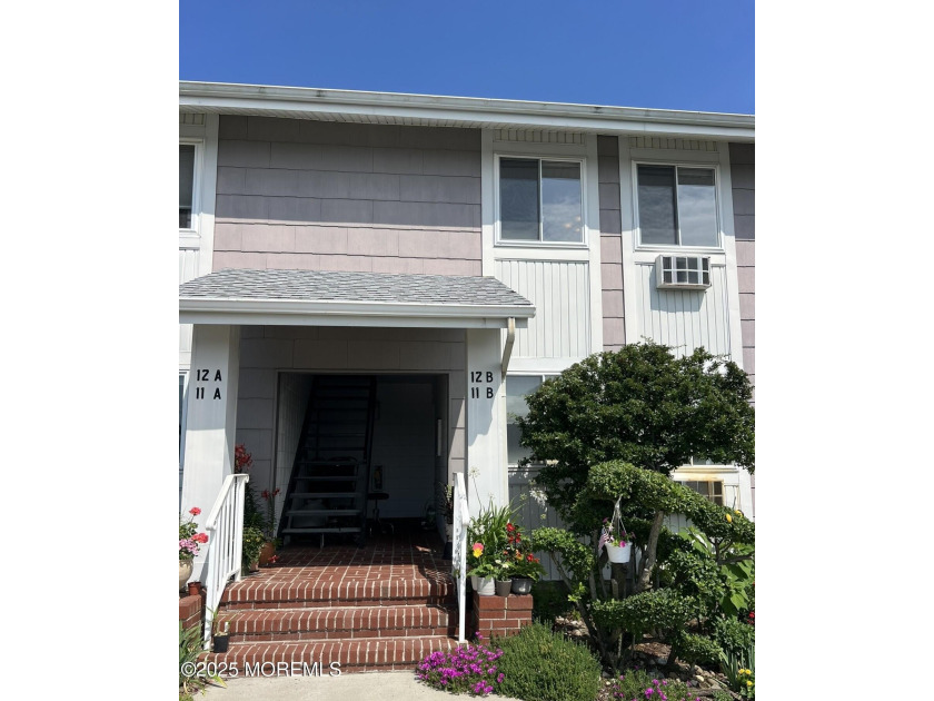 Experience the ease of coastal living in this sun-filled - Beach Condo for sale in Monmouth Beach, New Jersey on Beachhouse.com