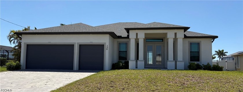 Stunning Pool Home on Basin of Freshwater Canal offers Three - Beach Home for sale in Cape Coral, Florida on Beachhouse.com