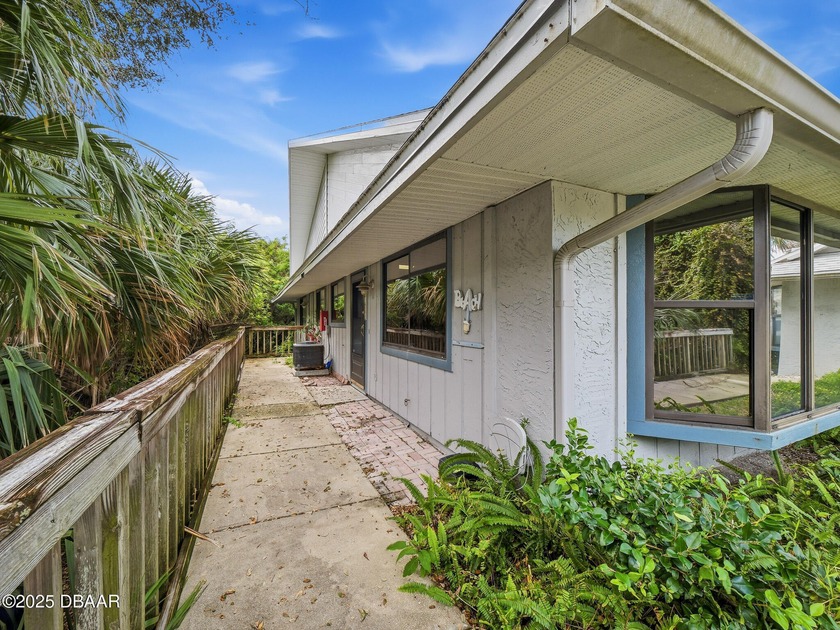 Just steps from the car-free beach, this coastal apartment in - Beach Condo for sale in New Smyrna Beach, Florida on Beachhouse.com