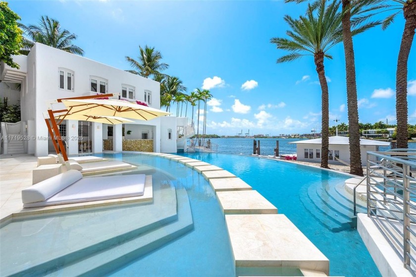 This Mykonos-inspired masterpiece, owned by former Ferrari F1 - Beach Home for sale in Miami Beach, Florida on Beachhouse.com