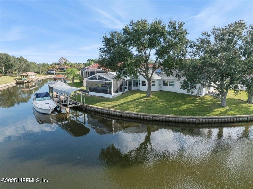Welcome to true waterfront living in Palm Coast, positioned on a - Beach Home for sale in Palm Coast, Florida on Beachhouse.com