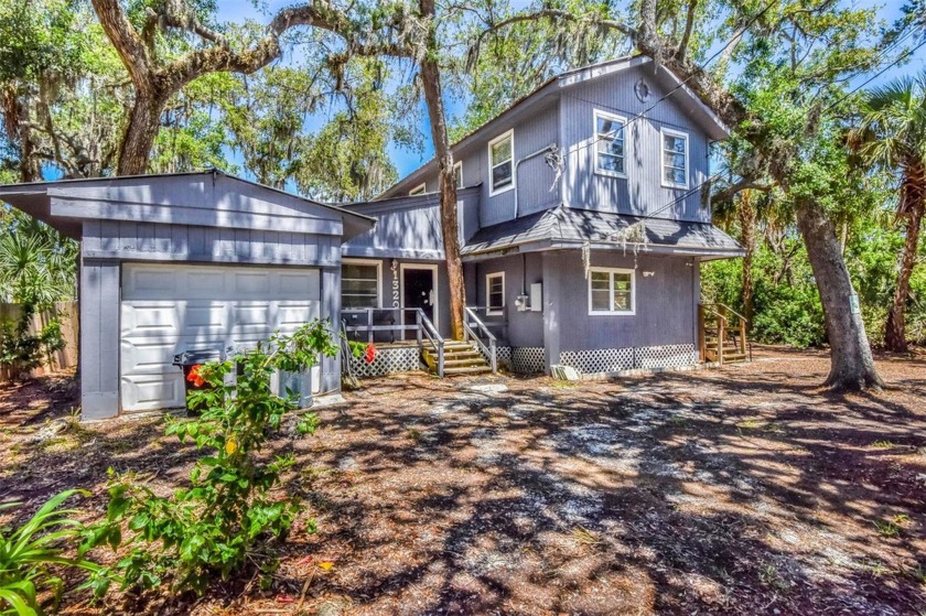 Welcome to this charming single-family home nestled in the - Beach Home for sale in Crystal River, Florida on Beachhouse.com