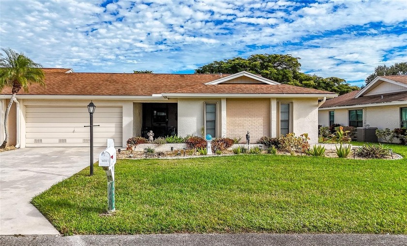Impeccably renovated and move-in ready, this elegant villa is - Beach Home for sale in Fort Myers, Florida on Beachhouse.com