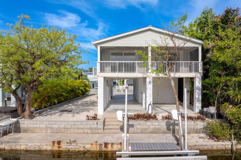 Enjoy calm mornings and serene evenings on the screened porch at - Beach Home for sale in Long Key, Florida on Beachhouse.com