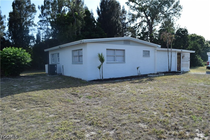 Welcome to this solidly built 1956 home, completely remodeled in - Beach Home for sale in Lehigh Acres, Florida on Beachhouse.com