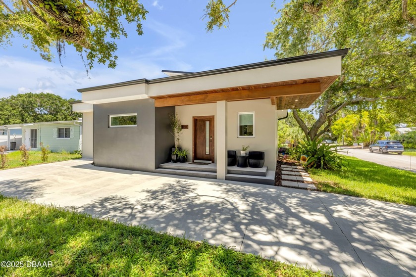 TWO HOUSES FOR THE PRICE OF ONE -- Luxury Coastal Living with a - Beach Home for sale in New Smyrna Beach, Florida on Beachhouse.com