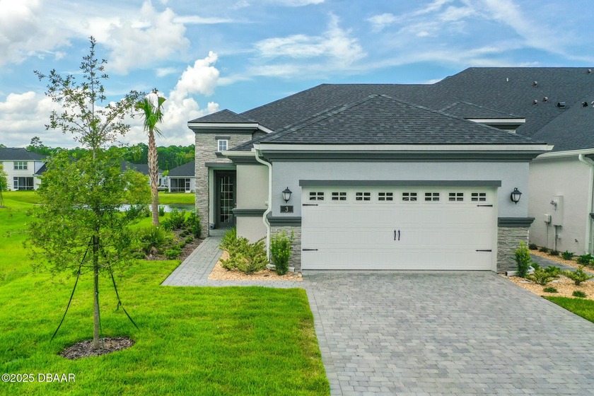 Welcome to this stunning 2-bedroom, 2-bathroom villa with a - Beach Townhome/Townhouse for sale in Ormond Beach, Florida on Beachhouse.com