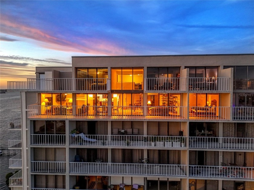 Nestled in a picturesque resort-like setting, this exquisite - Beach Condo for sale in Clearwater, Florida on Beachhouse.com