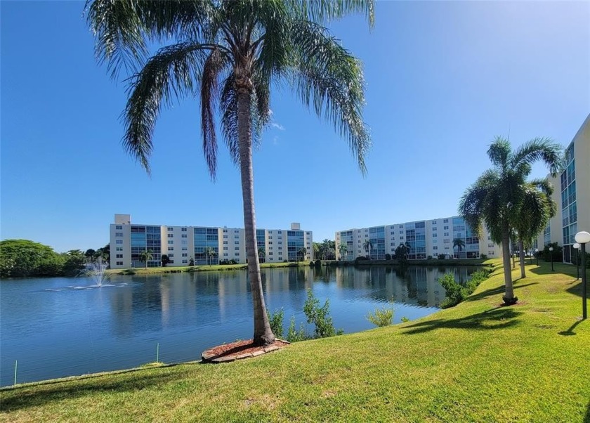 Wake up to stunning lake views in this oversized 1,100+ sq ft - Beach Condo for sale in Dania, Florida on Beachhouse.com