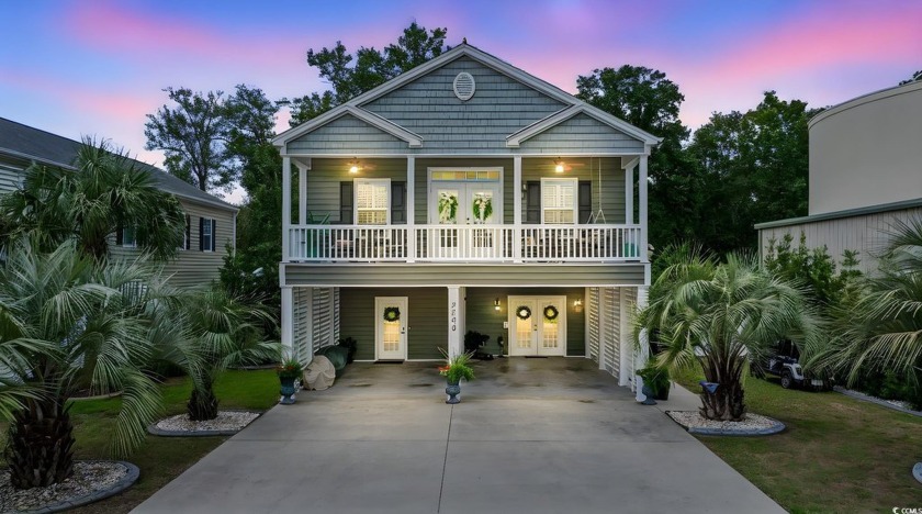 Just steps from the Intracoastal Waterway and boat launch, this - Beach Home for sale in North Myrtle Beach, South Carolina on Beachhouse.com
