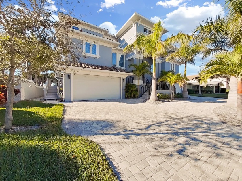 This immaculate home is located in one of the most sought after - Beach Home for sale in Belleair Beach, Florida on Beachhouse.com
