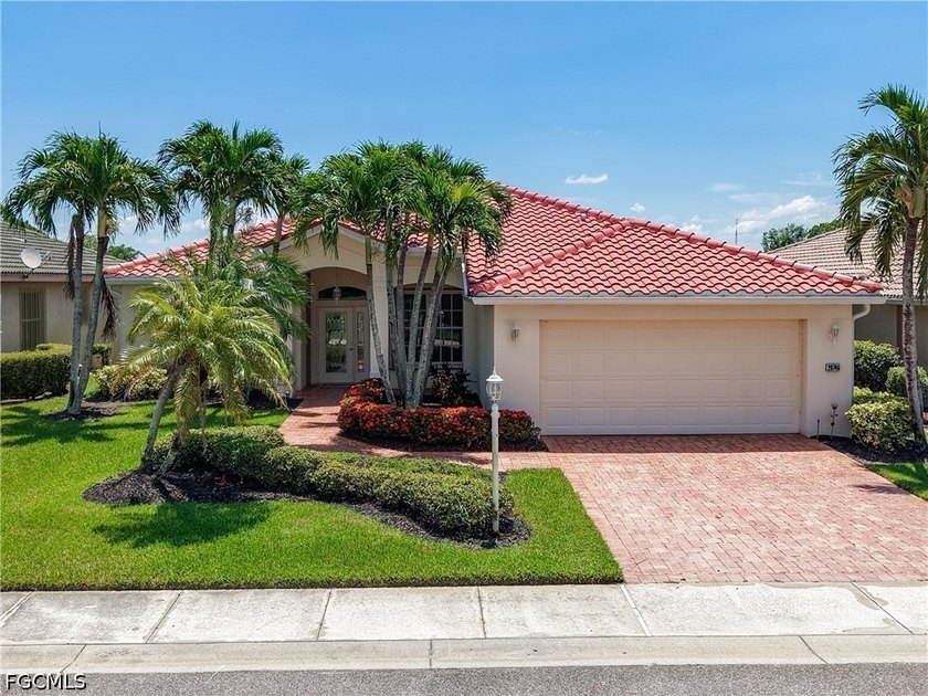 This beautifully maintained Sandpiper home in HERONS GLEN - Beach Home for sale in North Fort Myers, Florida on Beachhouse.com