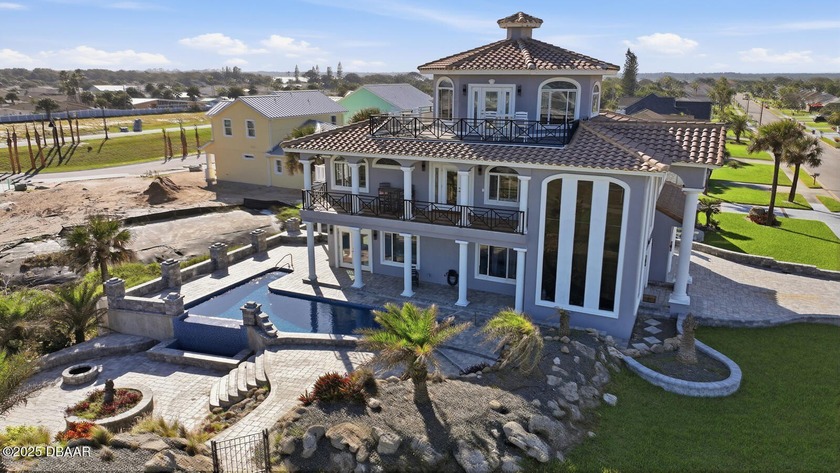 Experience true luxury living in this custom-built, 3-story - Beach Home for sale in Ormond Beach, Florida on Beachhouse.com