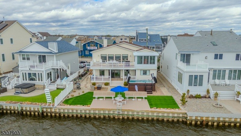 Discover the pinnacle of bayfront luxury living with this - Beach Home for sale in Brick, New Jersey on Beachhouse.com