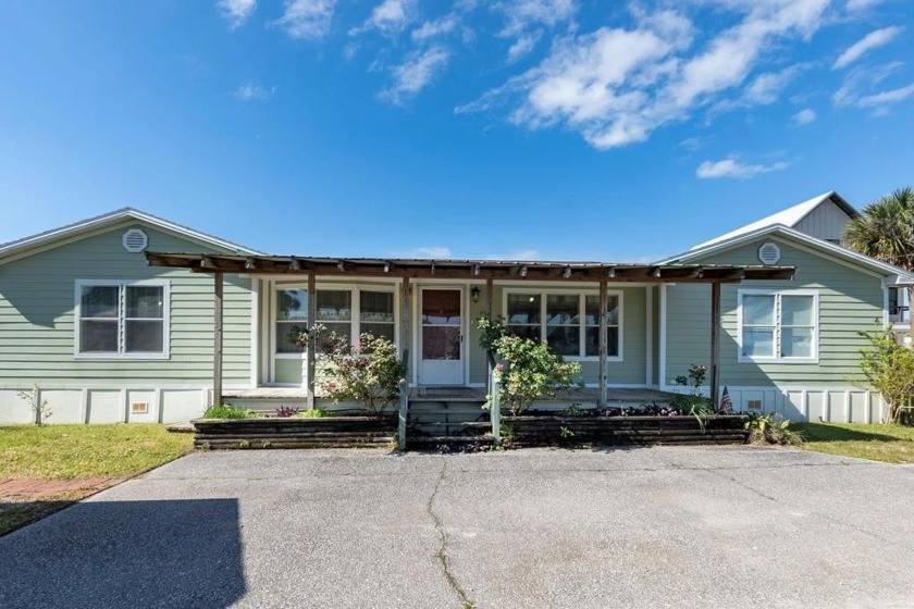 Welcome to your dream beachside retreat at St. Joe Beach! This - Beach Home for sale in Port St Joe, Florida on Beachhouse.com