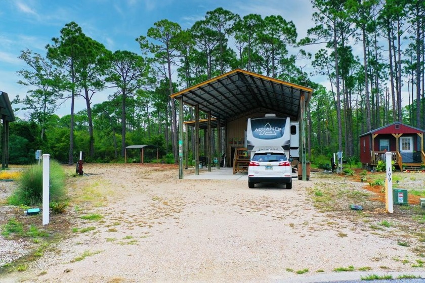 Welcome to your perfect getaway spot! This established RV lot - Beach Lot for sale in Port St Joe, Florida on Beachhouse.com