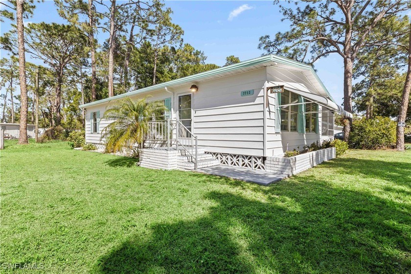 A private retreat surrounded by wooded areas and large pine - Beach Home for sale in North Fort Myers, Florida on Beachhouse.com