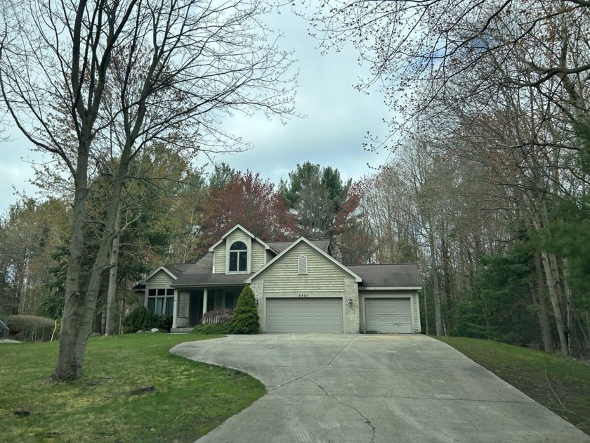 Nestled in the serene Evergreen subdivision, Home offers offers - Beach Home for sale in Norton Shores, Michigan on Beachhouse.com