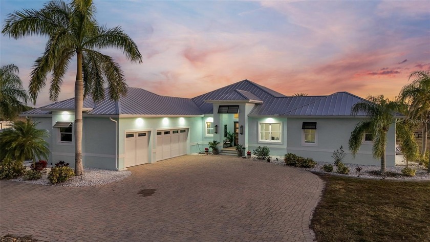 Experience the pinnacle of luxury, privacy, and space with this - Beach Home for sale in Punta Gorda, Florida on Beachhouse.com