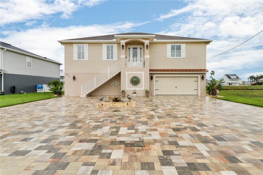 Welcome to your waterfront paradise! This custom-built home - Beach Home for sale in Hernando Beach, Florida on Beachhouse.com