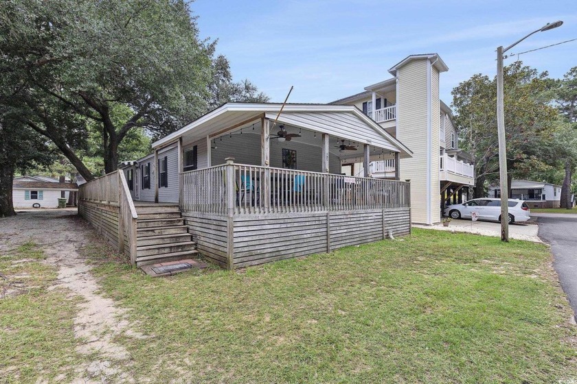 Welcome to your perfect coastal getaway in the vibrant Ocean - Beach Home for sale in Myrtle Beach, South Carolina on Beachhouse.com